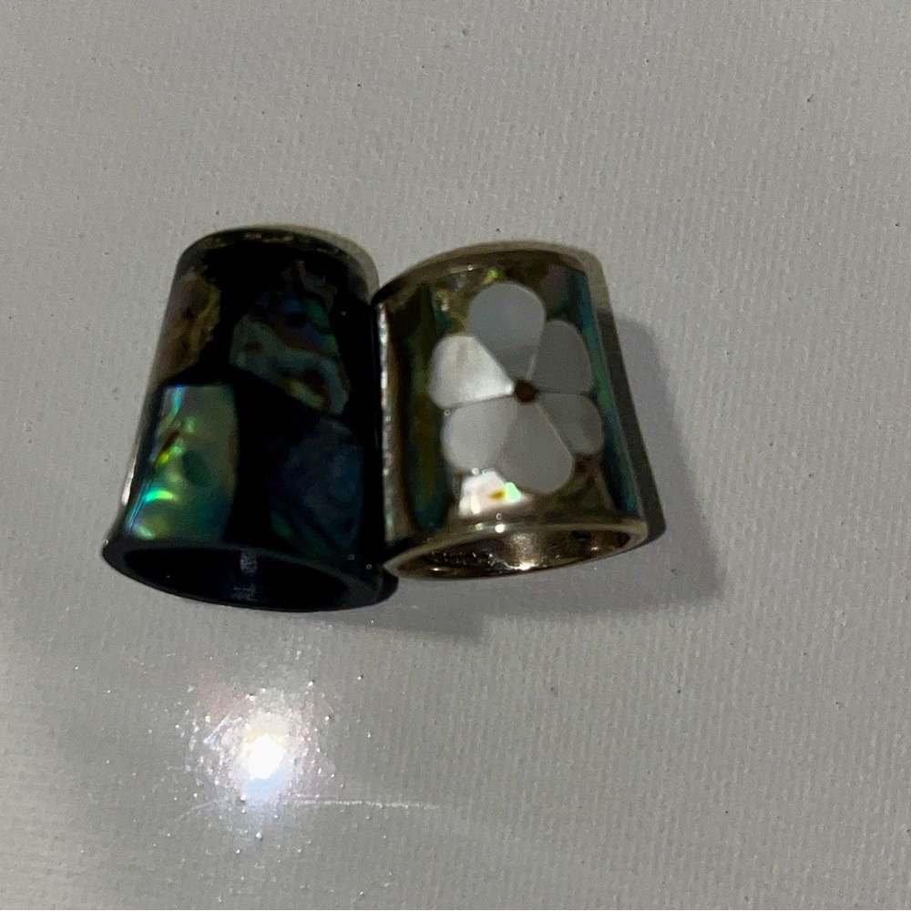Two beautiful thimbles. Mother of Pearl and Paua Shell